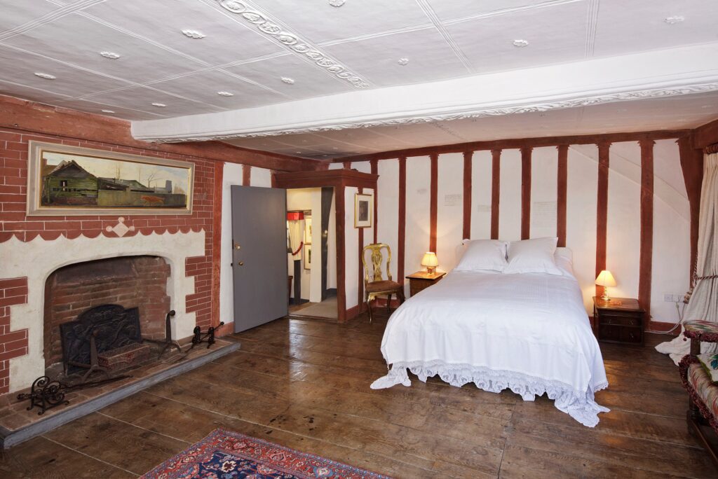 Bedfield bedroom and fireplace