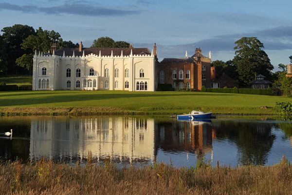 Combermere Abbey across the lake