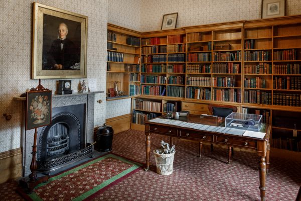 Elizabeth Gaskell's House musuem with painting and desk