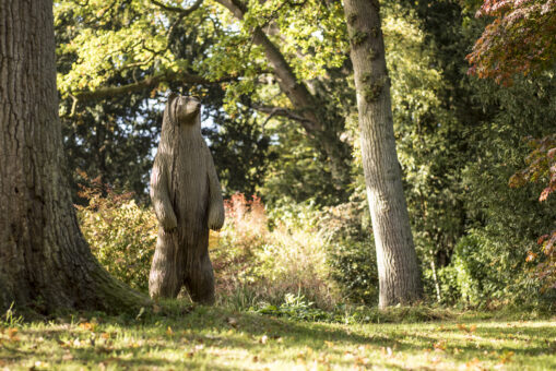 Englefield House garden and wooden bear sculpture
