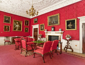 Fairfax House red wallpaper with paintings