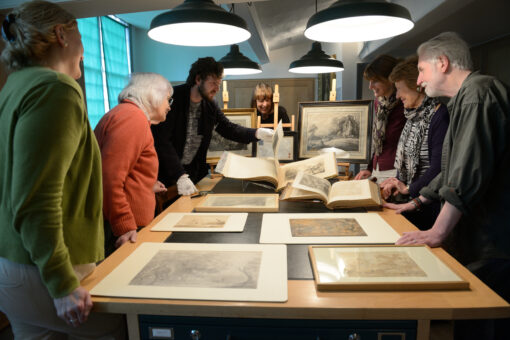 Gainsborough's House visitors viewing the archive