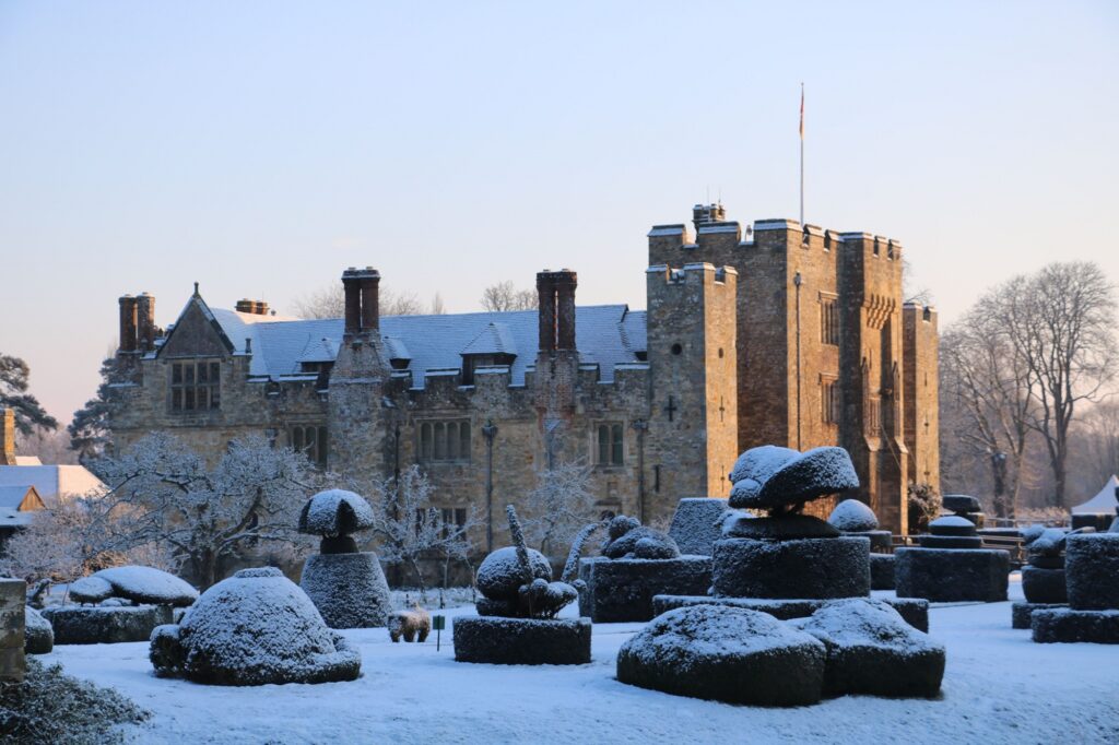 Hever Castle snow on the topiary garden