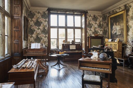 Holdenby House Drawing Room with piano and painting