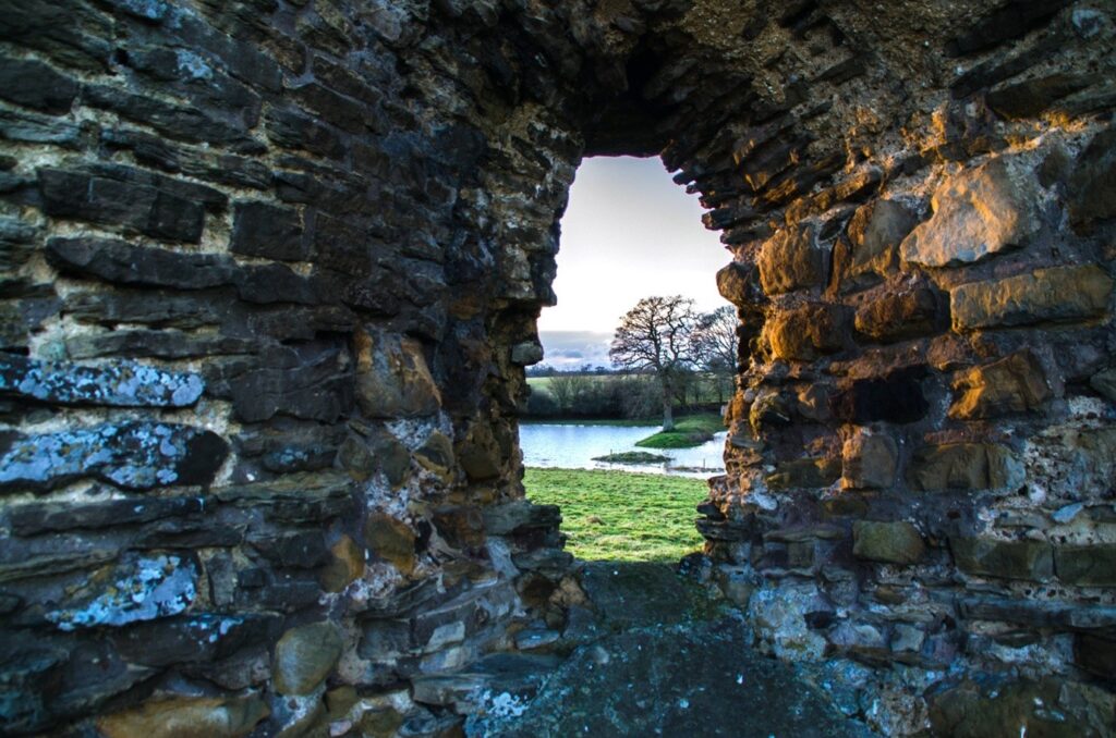 Knepp Estate moat through the ruins of the Norman keep