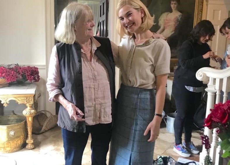 Lilly James and the Countess of Sandwich filming Rebecca for Netflix in 2020
