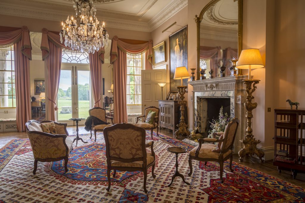 Stansted Park Drawing Room with fireplace and chandelier