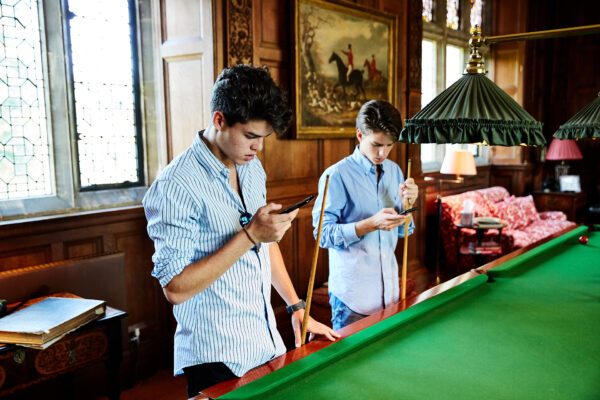 Teenagers on phones Sudeley