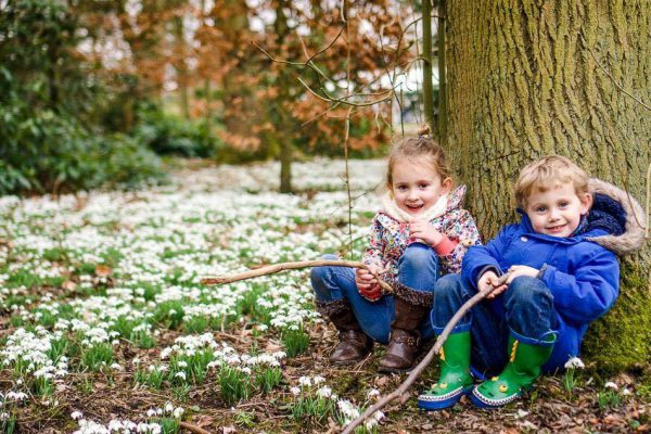 Children at Hodsock Priory in the snowdrops