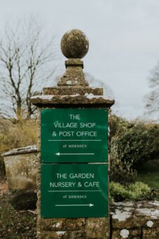 Miserden Gardens sign in the grounds