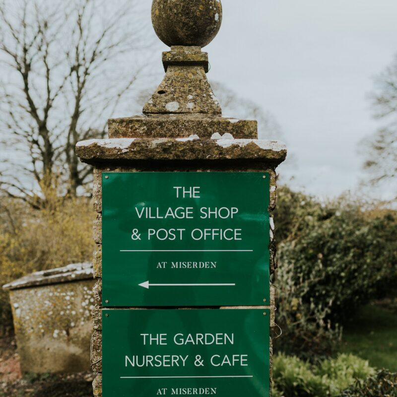 Miserden Gardens sign in the grounds