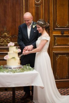 Camden Place wedding guests cutting cake