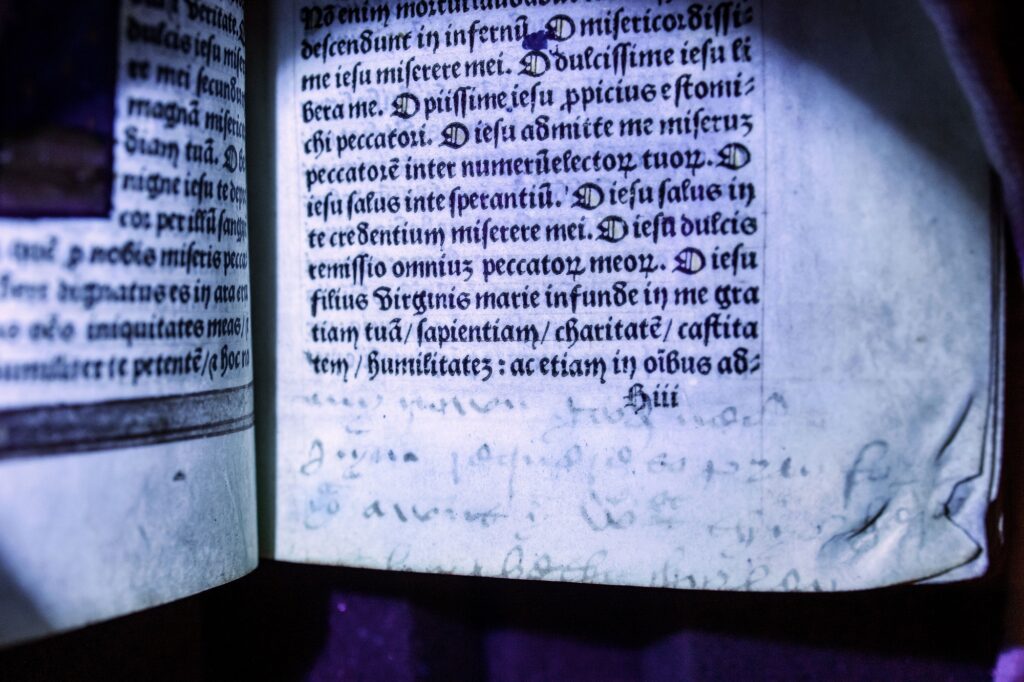 Ultraviolet light reveals not seen before names and words hidden in Anne Boleyn’s historic prayerbook, Hever Castle, Kent.